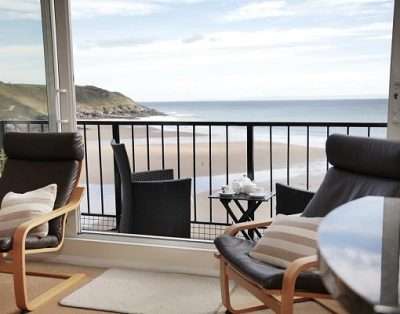 Redcliffe Apartments overlooking the limestone cliffs and sands of Caswell Bay.