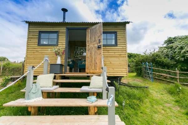 Secluded timber lodge at Ynys Hideout near the coastal paths and sheltered coves of Moelfre.