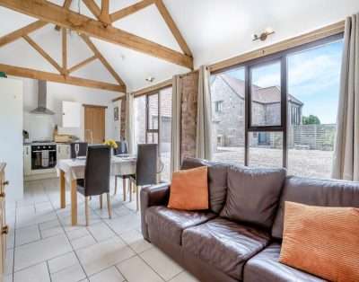 Open-plan kitchen and living area at Court Park Barn, near Chepstow