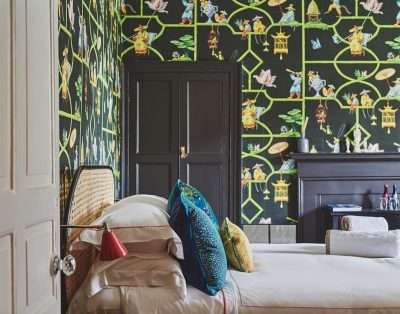 Bedroom with bold green chinoiserie wallpaper at Valley Manor, Vale of Glamorgan