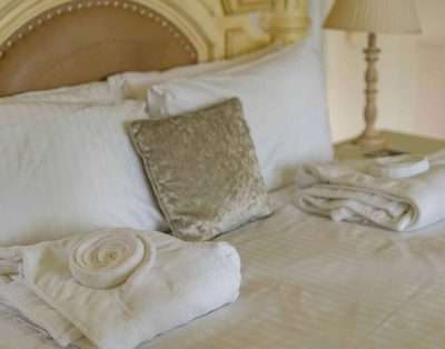 The Mellington Suite four-poster room at Mellington Hall Hotel
